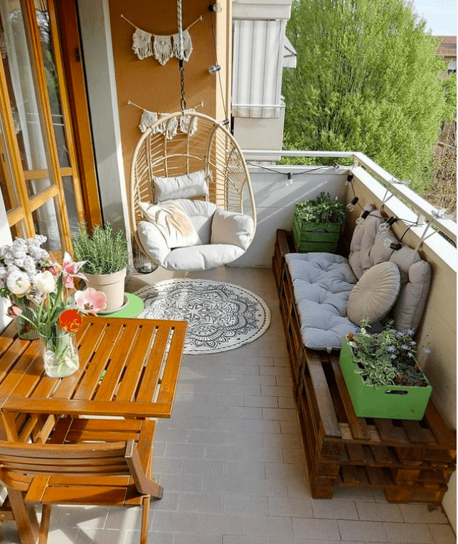 a swing chair on a balcony