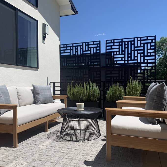 a metal privacy screen on a balcony