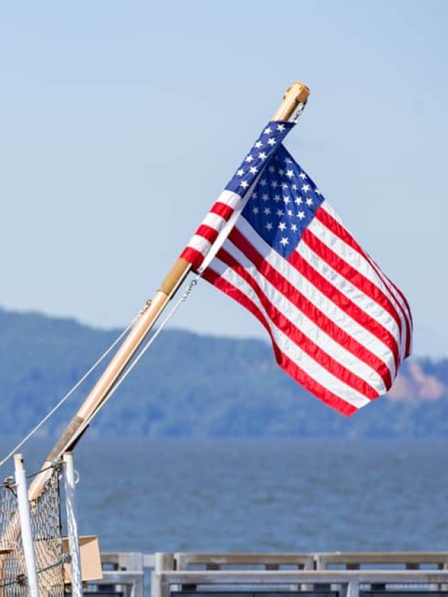 American,Flag,Wrapped,Around,Wooden,Pole.