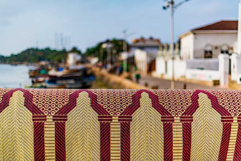 rug covering high rise balcony railing