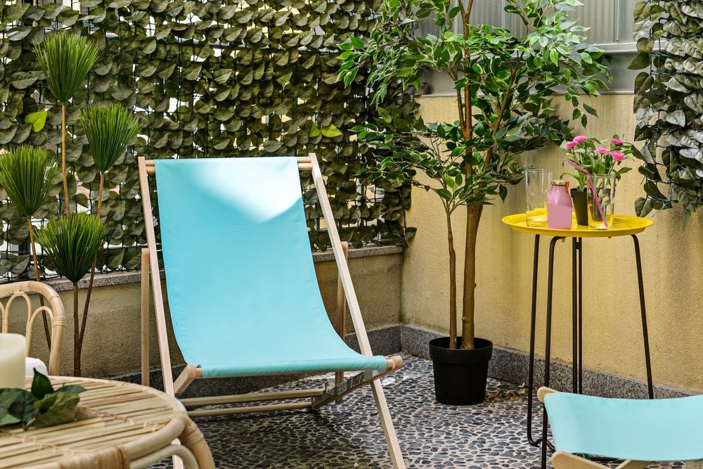 achieving privacy on a balcony with artificial plants