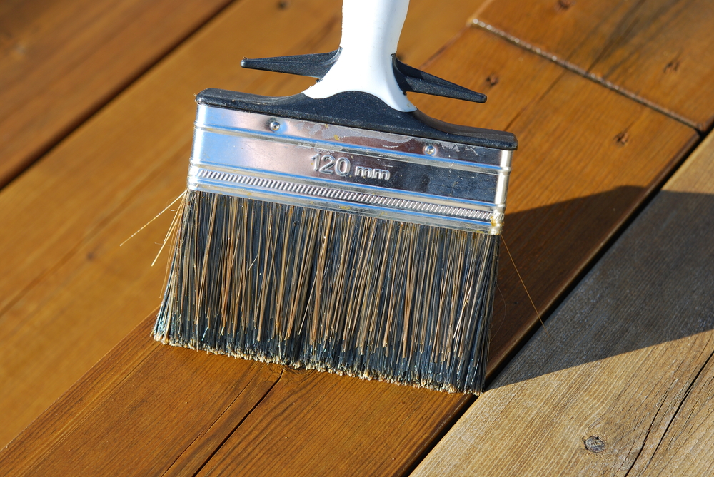 oiling a wooden balcony